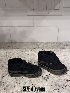 Vans Kids Black High-Top Sneakers with Camo Sole